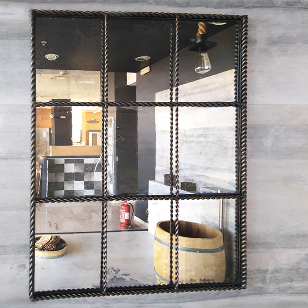 Mirror 70x90cm metallic with twisted steel blade